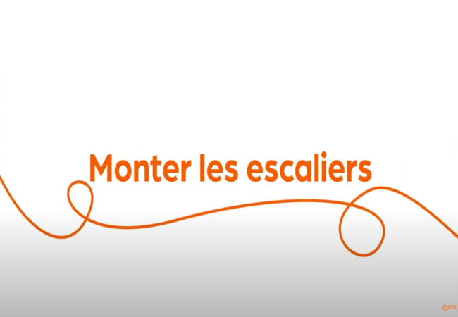 Texte « Monter les escaliers » avec une spirale orange sur fond blanc.