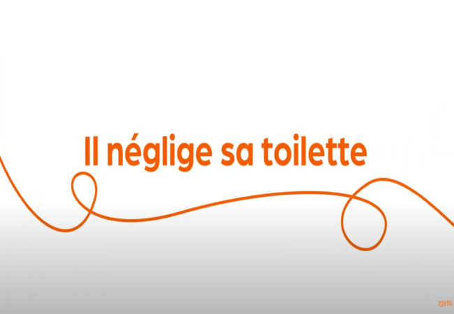 Texte « Il néglige sa toilette » avec une spirale orange sur fond blanc.